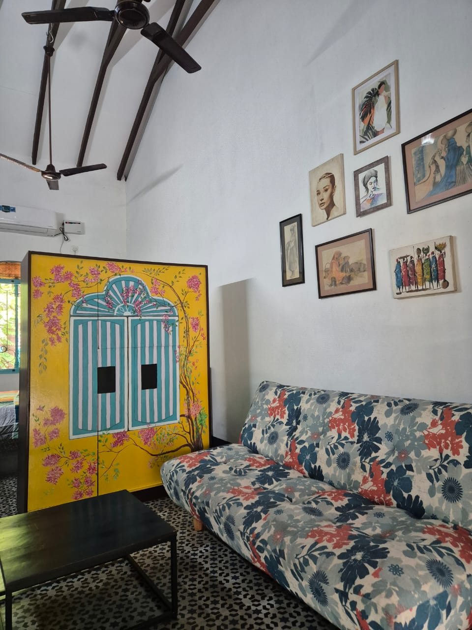 Nana's Room living area — comfortable seating, heritage villa interior, relaxed atmosphere
