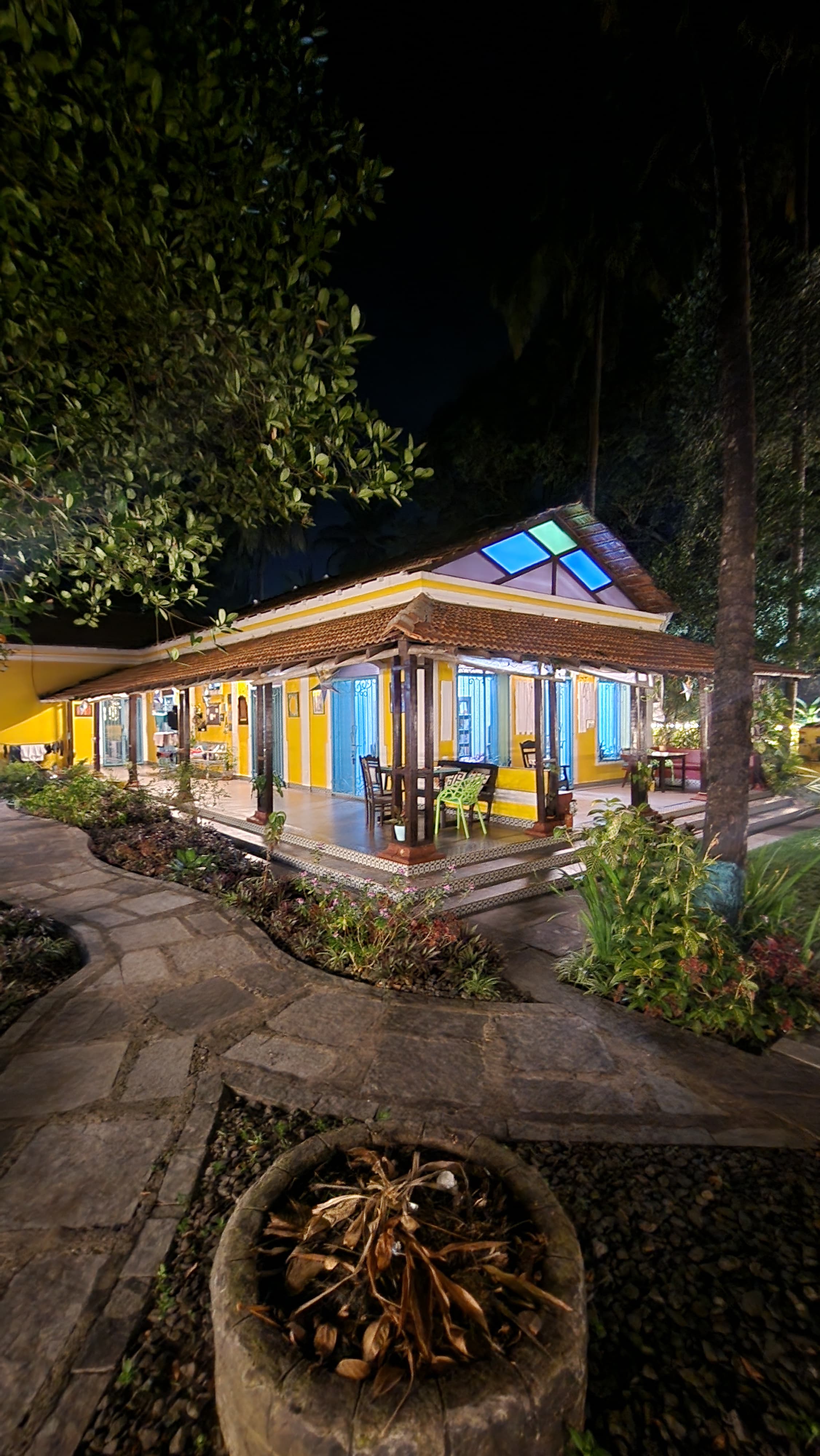 Night view of Valentine Villa from the fire pit — atmospheric evening ambience