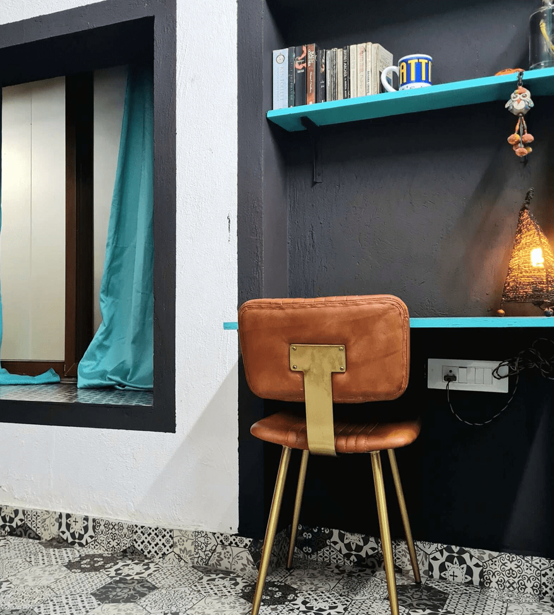 Dedicated work desk in the Loft Room at Valentine Villa Goa, featuring a spacious wooden table, ergonomic chair, and reliable high-speed WiFi for a productive workation stay.