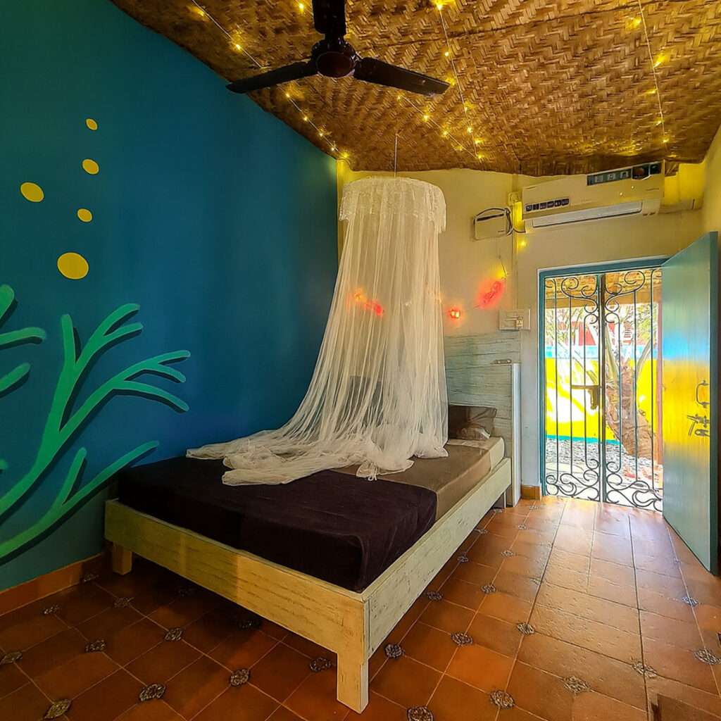 Soppo Rustic Cottage at Valentine Villa - a cozy, private heritage room with traditional Goan decor, vintage furniture, and a serene garden view for a perfect slow living escape.
